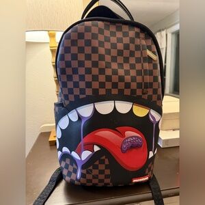 Sprayground Brown and Black Checkered Backpack with Graphic